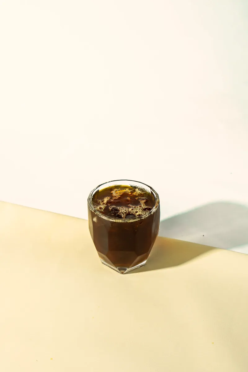 Tall glass of cold brew coffee over ice